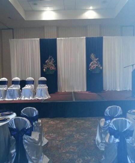 Drapery Wall on stage — Wall of drapes for the Cox party at the Hilton on Pensacola Beach