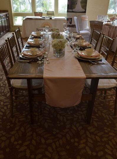 We have wooden farm tables for your event.