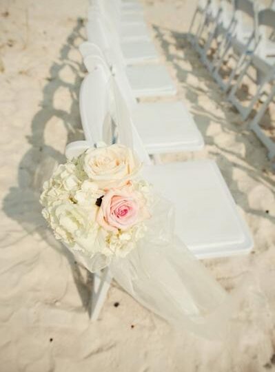 White Folding Chairs on Pensacola Beach